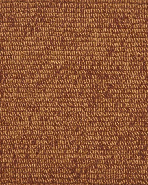 Close up view of textured Napoleon Tip Shear Loop rug in bronze brown colour