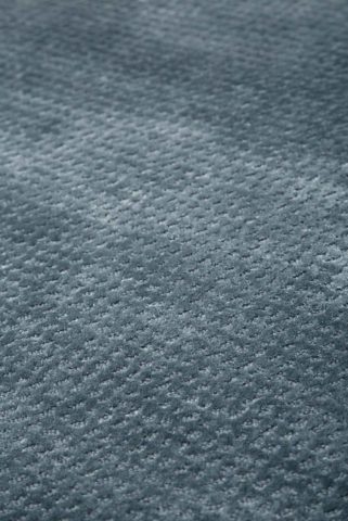 Close up view of textured Nickel rug in denim colour