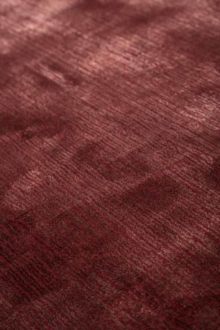 Close up view of Safari rug in wine mix colour